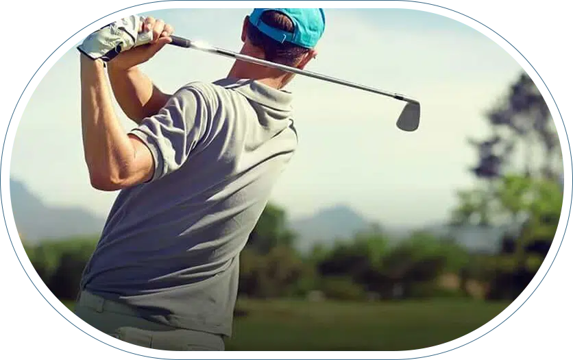 Man playing golf in need of help from an orthopedic surgeon specializing in shoulders.
