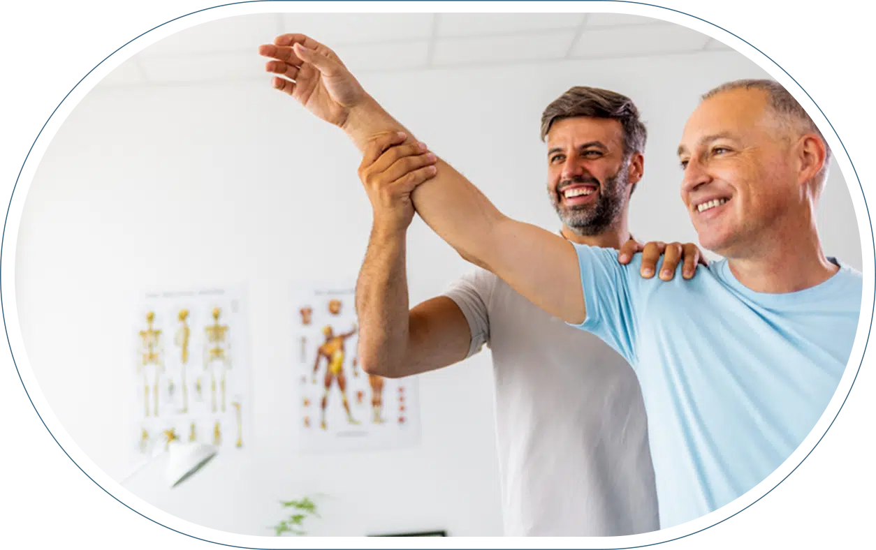 Orthopedic doctor helping a patient stretch their arm in an IME.