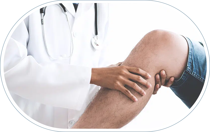 Doctor providing orthopedic services by examining a patient's knee.